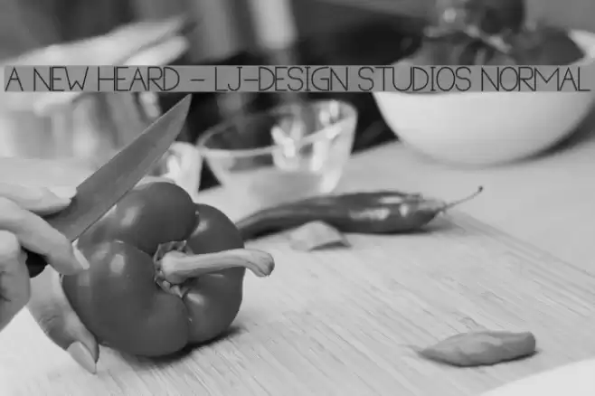 A new Heard - LJ-Design Studios Normal Font examples