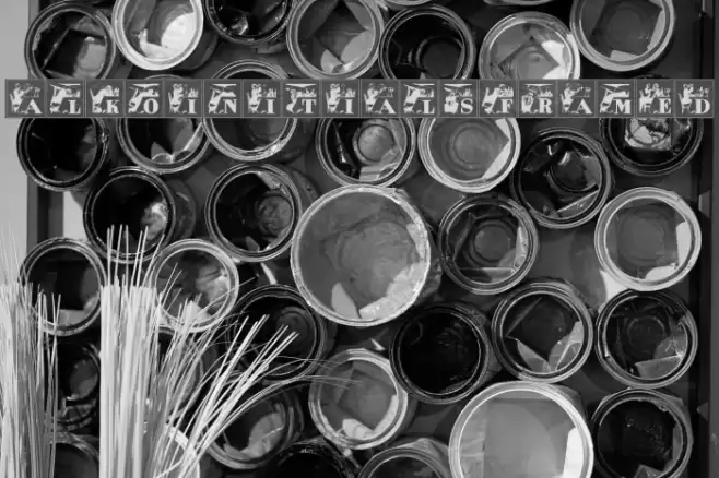 AlkoInitialsFramed Font examples