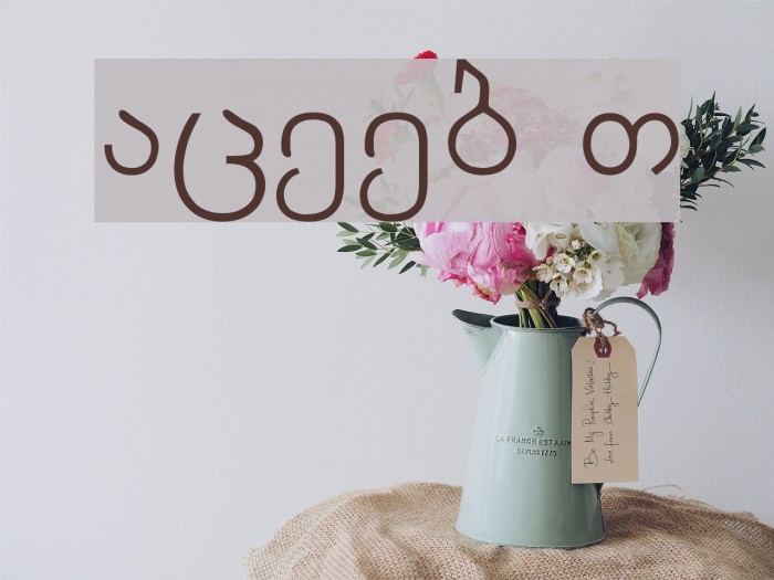 Arachveulebrivi Thin Font examples