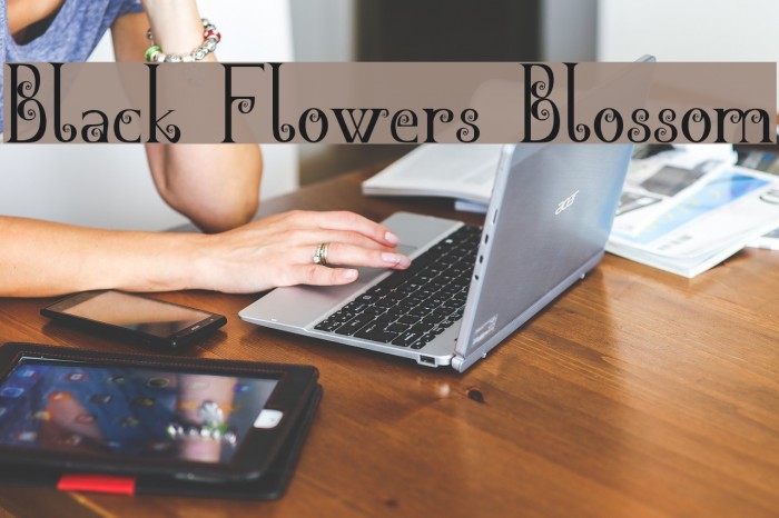 Black Flowers Blossom Font examples
