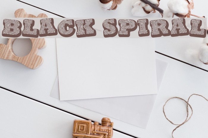 Black spiral Font examples