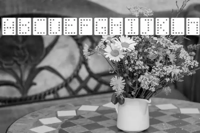 Domino-Effect-Normal Font examples