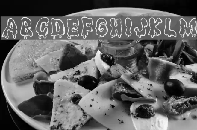 Ghouly Caps Font examples