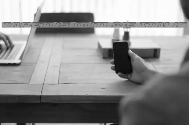 Iapetus Outline Italic Font examples