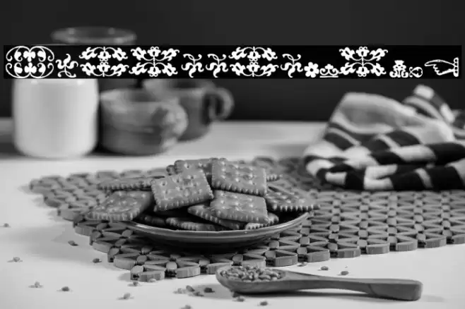 IM_FELL_FLOWERS_2 Font examples