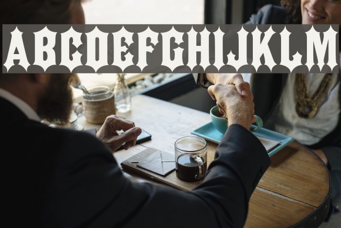 JMH IRON CAPS Regular Font examples