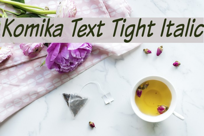 Komika Text Tight Italic Font examples