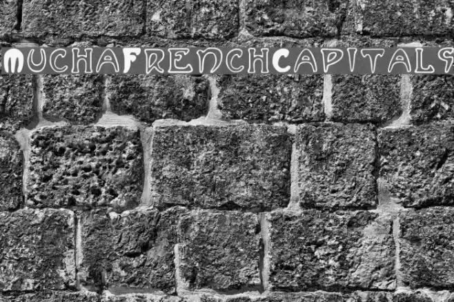 MuchaFrenchCapitals Font examples