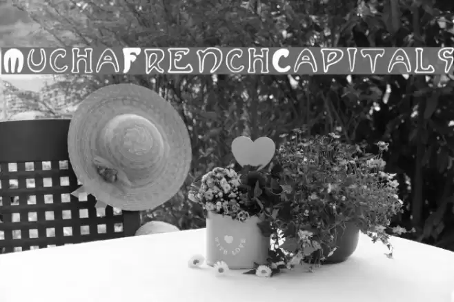 MuchaFrenchCapitals Font examples