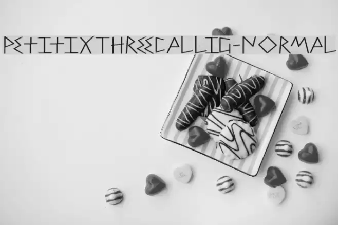 PetitixThreeCallig-Normal Font examples