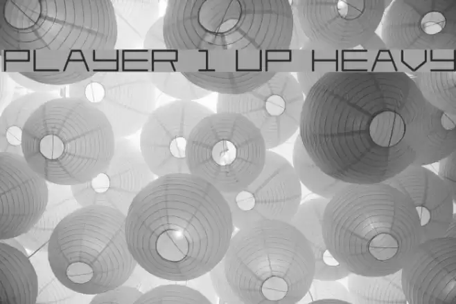 Player 1 Up Heavy Font examples
