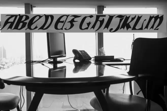 QuaelGothicItalics Font examples