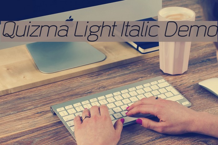 Quizma Light Italic Demo Font examples