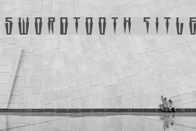Swordtooth Title Font examples