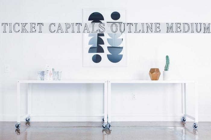 Ticket Capitals Outline Medium Font examples