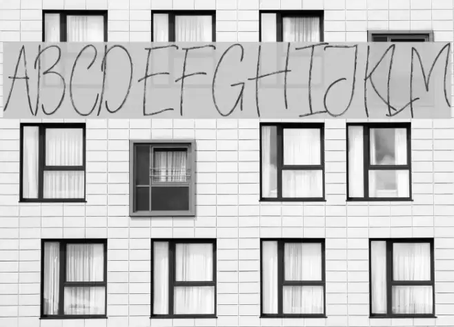 VerticalBrushyFree Font examples