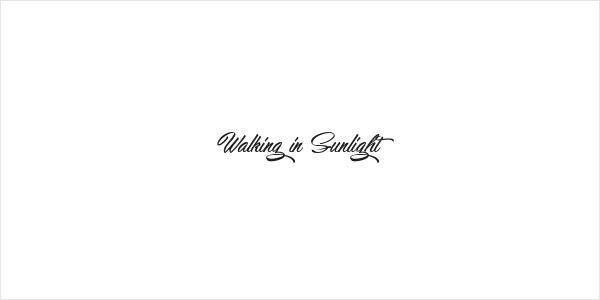 Walking in Sunlight Logo