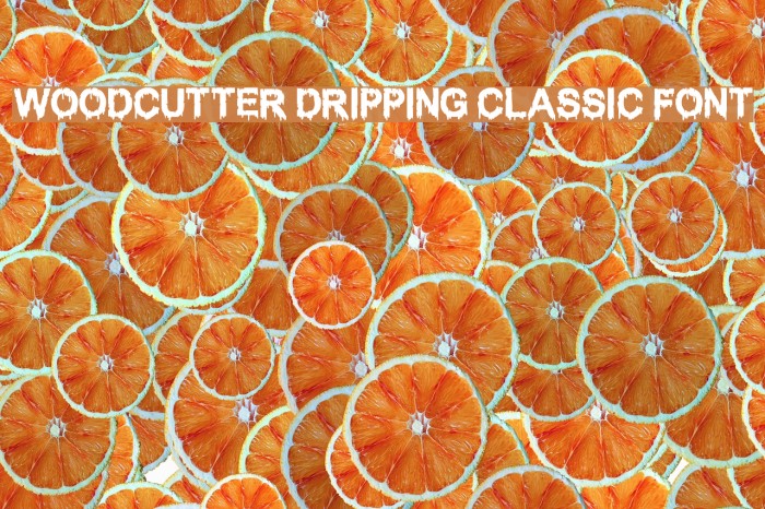 WOODCUTTER DRIPPING CLASSIC FONT Font examples