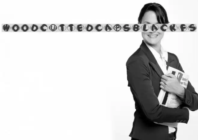 WoodcuttedCapsBlackFS Font examples