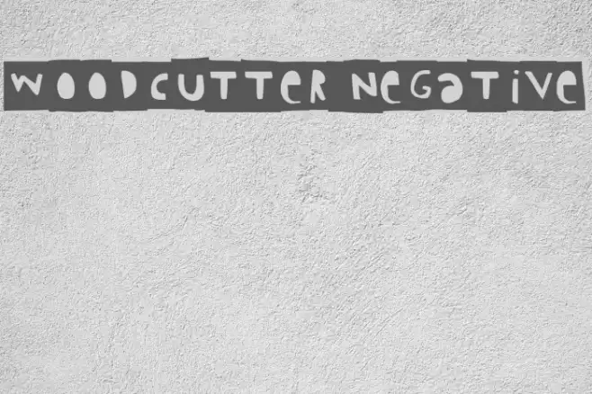 Woodcutter Negative Font examples