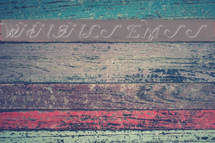 Wrenn Initials Embossed Font examples